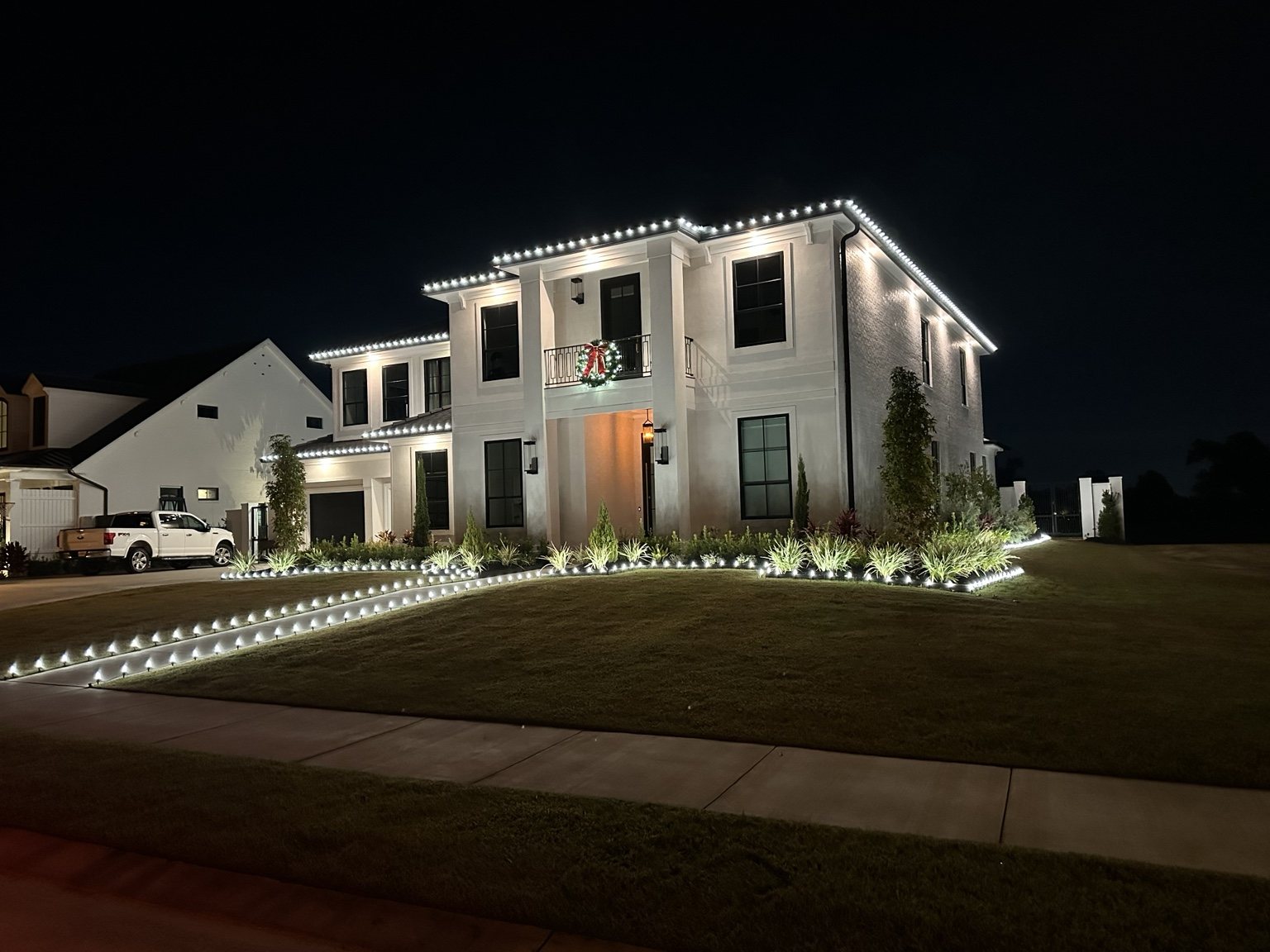 Roofline Christmas lights viewed during installation
