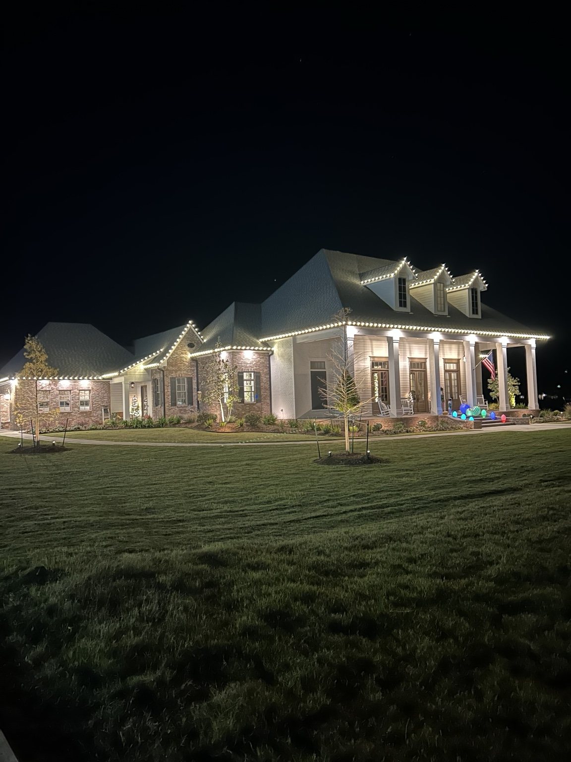 Large custom residential Christmas lighting installation